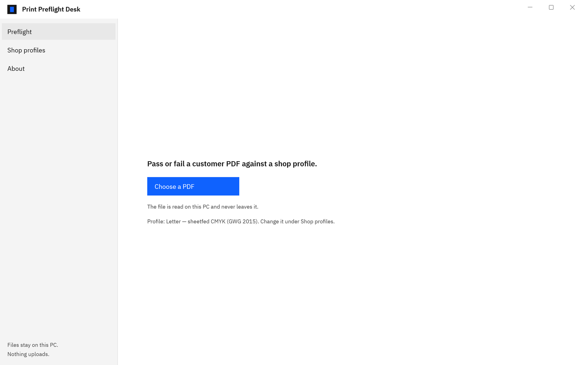 Print Preflight Desk opening screen with the line Pass or fail a customer PDF against a shop profile, a Choose a PDF button, and the active profile name.